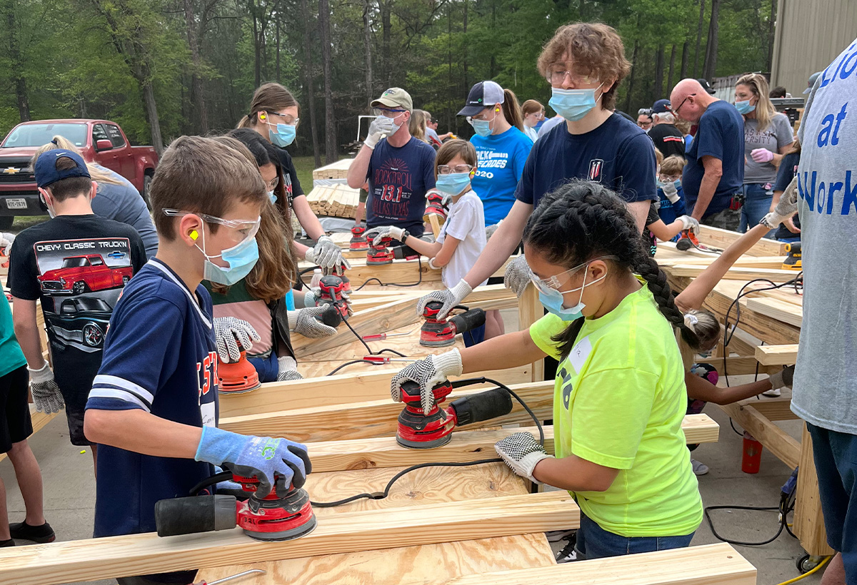 Fifty6 students serving